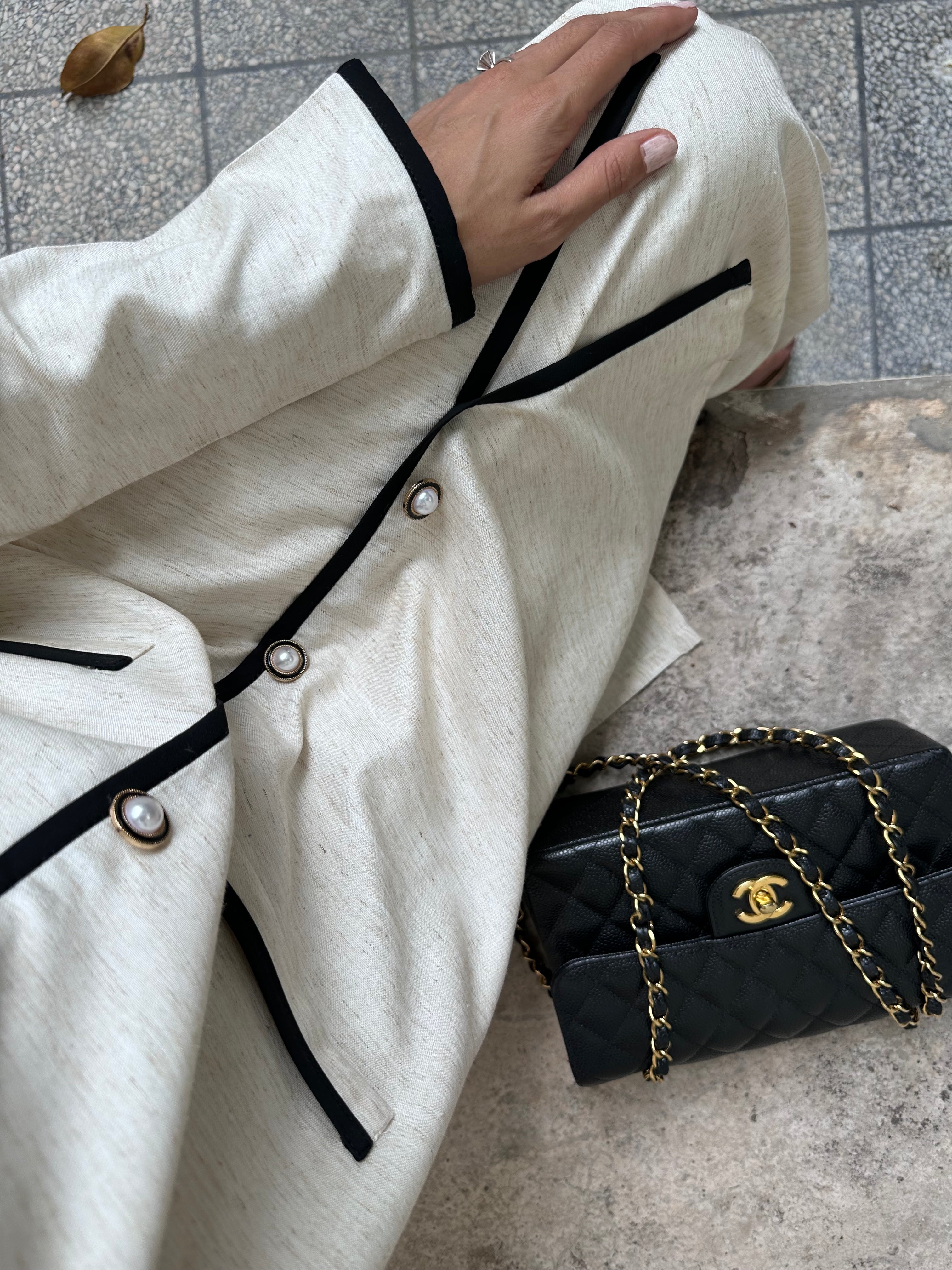 BOUCLE SET IN HEATHERED OAT WOOL