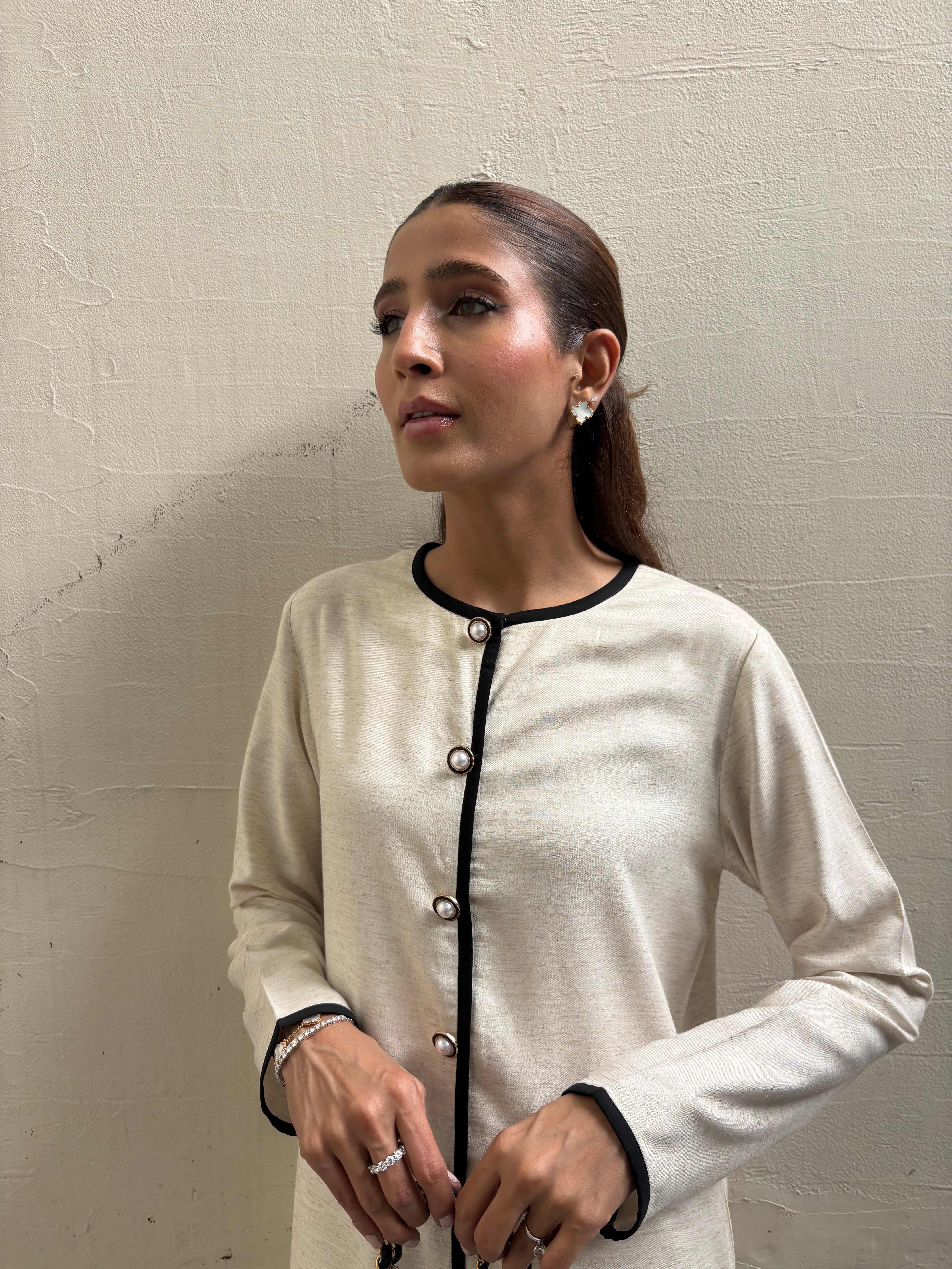 BOUCLE SET IN HEATHERED OAT WOOL